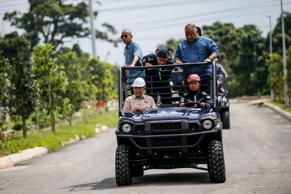 Deputy Prime Minister Datuk Seri Ahmad Zahid Hamidi arrives at the SMART Malaysian Special Search and Rescue Team Headquarters to deliver his new year’s address to Nadma staff in Pulau Meranti, Puchong, January 19, 2024. — Picture by Hari Anggara