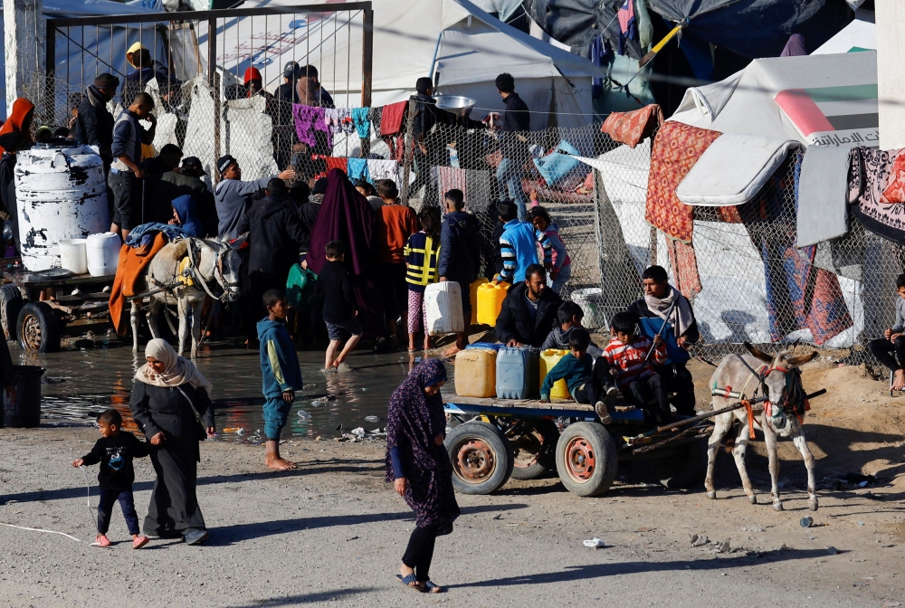 Displaced Palestinians, who fled their houses due to Israeli strikes, shelter at a tent camp, amid the ongoing conflict between Israel and Hamas, in Rafah in the southern Gaza Strip, January 18, 2024. ― Reuters pic
