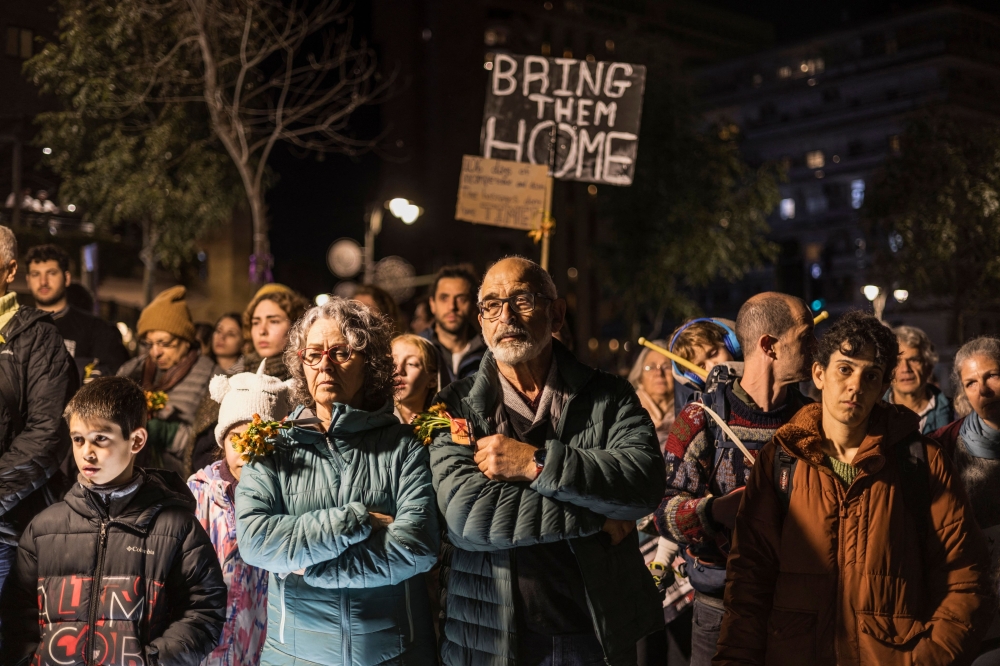 Demonstrators rally near the residence of the Israeli Prime Minister in Jerusalem on January 20, 2024, to call for the release of Israeli hostages held in Gaza since the October 7 attacks by Palestinian Hamas militants. — AFP pic