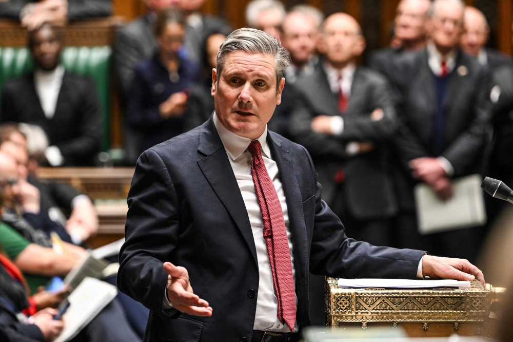 File photo of a handout photograph released by the UK Parliament showing Britain’s main opposition Labour Party leader Keir Starmer speaking during the weekly session of Prime Minster's Questions (PMQs) in the House of Commons, in London, on January 17, 2024. — AFP pic