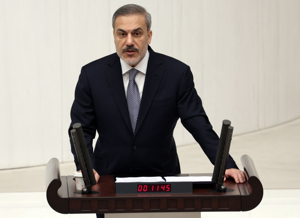 File photo of Turkish Minister of Foreign Affairs Hakan Fidan delivering a speech at the General Assembly of the Turkish Grand National Assembly, about security measures, against terrorism, in Ankara, on January 16, 2024. — AFP pic