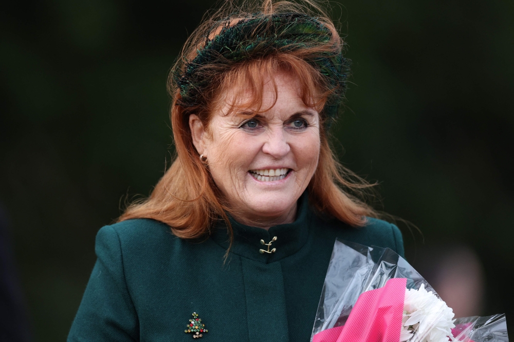 Sarah, Duchess of York smiles outside after attending the Royal Family's traditional Christmas Day service at St Mary Magdalene Church on the Sandringham Estate in eastern England, on December 25, 2023. — AFP pic