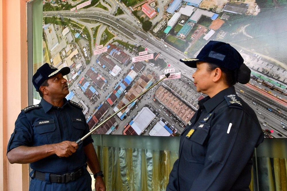 Selangor Police Chief Datuk Hussein Omar Khan (left) said the seven roads in the Batu Caves area will be closed to reduce traffic congestion in anticipation of two million visitors expected to converge to the Sri Subramaniar Swamy Temple in Batu Caves during the festival period. — Bernama pic