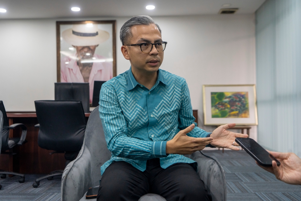 Communication minister Fahmi Fadzil speaks during his visit to the Malay Mail office in Petaling Jaya January 22, 2024. — Picture by Shafwan Zaidon