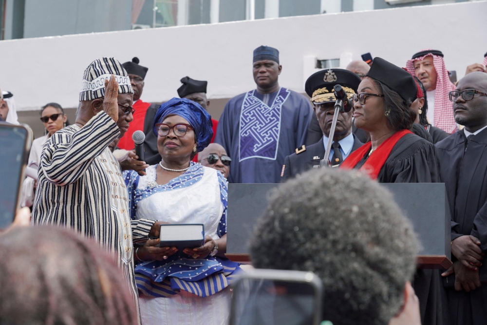 Liberia's president-elect Joseph Boakai, who defeated President George Weah in a runoff election takes an oath as president during the inauguration ceremony in Monrovia, Liberia January 22, 2024. — Reuters pic