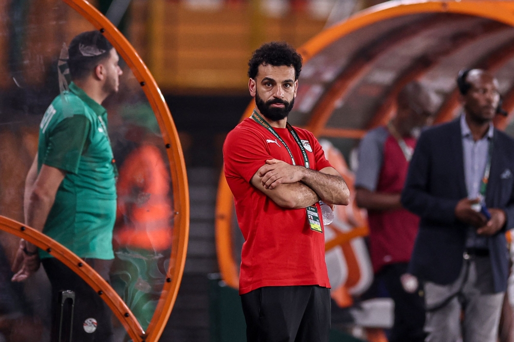 Egypt's forward Mohamed Salah (centre) looks on ahead of the Africa Cup of Nations 2024 group B football match between Cape Verde and Egypt at the Felix Houphouet-Boigny Stadium in Abidjan January 22, 2024. — AFP pic