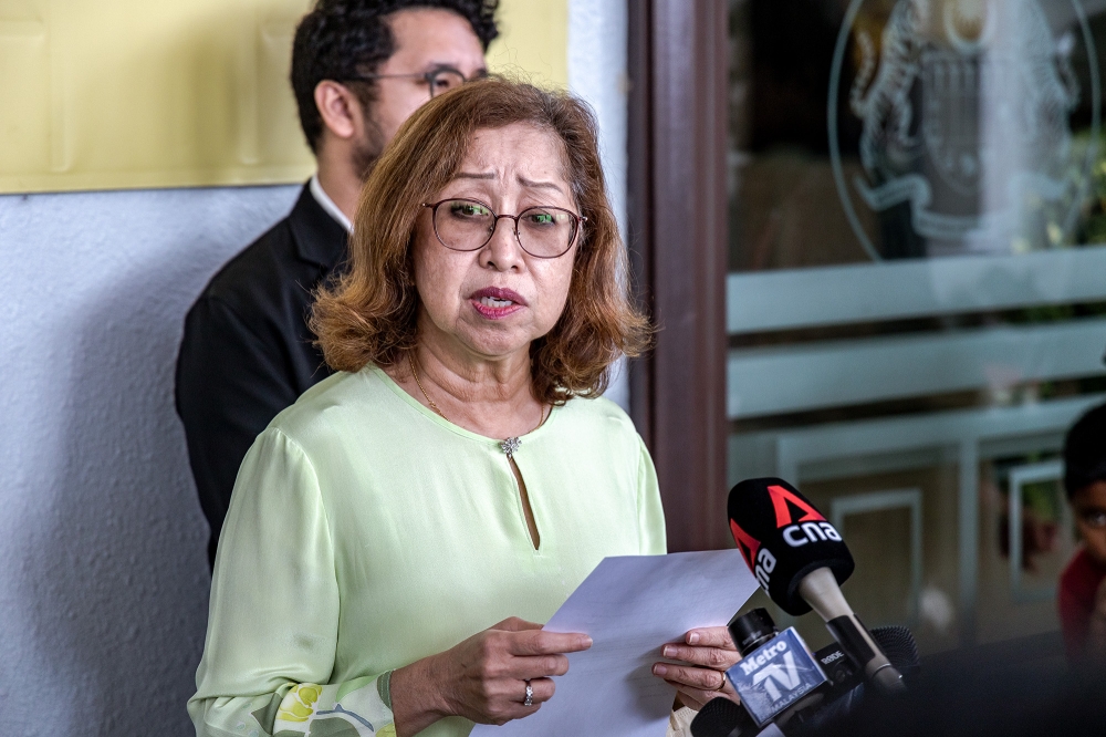 Former finance minister Tun Daim Zainuddin's wife Toh Puan Nai'mah Abdul Khalid speaks to reporters at the Kuala Lumpur Court Complex January 23, 2024. ― Picture by Firdaus Latif