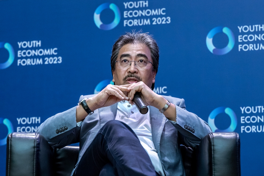 Datuk Seri Johari Abdul Ghani says the government has agreed to allow the hiring of foreign workers specifically for the plantation sector under the Ministry of Plantation and Commodities (KPK). — Picture by Firdaus Latif