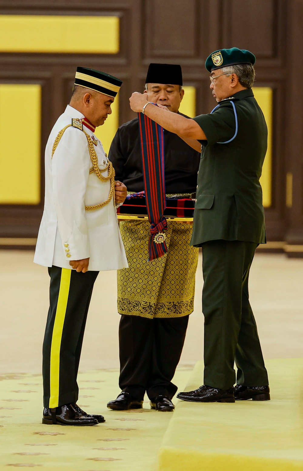 Army chief General Tan Sri Muhammad Hafizuddeain Jantan headed the list of 321 recipients of federal awards, honours and medals at the investiture ceremony at Istana Negara in Kuala Lumpur January 23, 2024. — Bernama pic