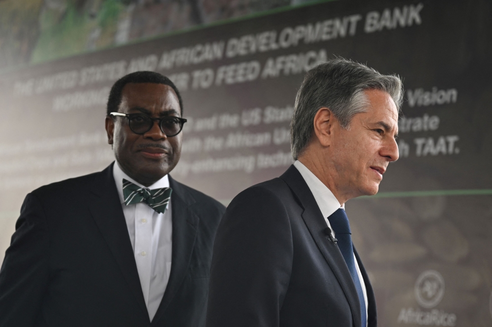 President of the African Development Bank Group Akinwumi Adesina walks with U.S. Secretary of State Antony Blinken following their meeting at the AfricaRice Headquarters in Abidjan, Ivory Coast on January 23, 2024. — Reuters pool pic
