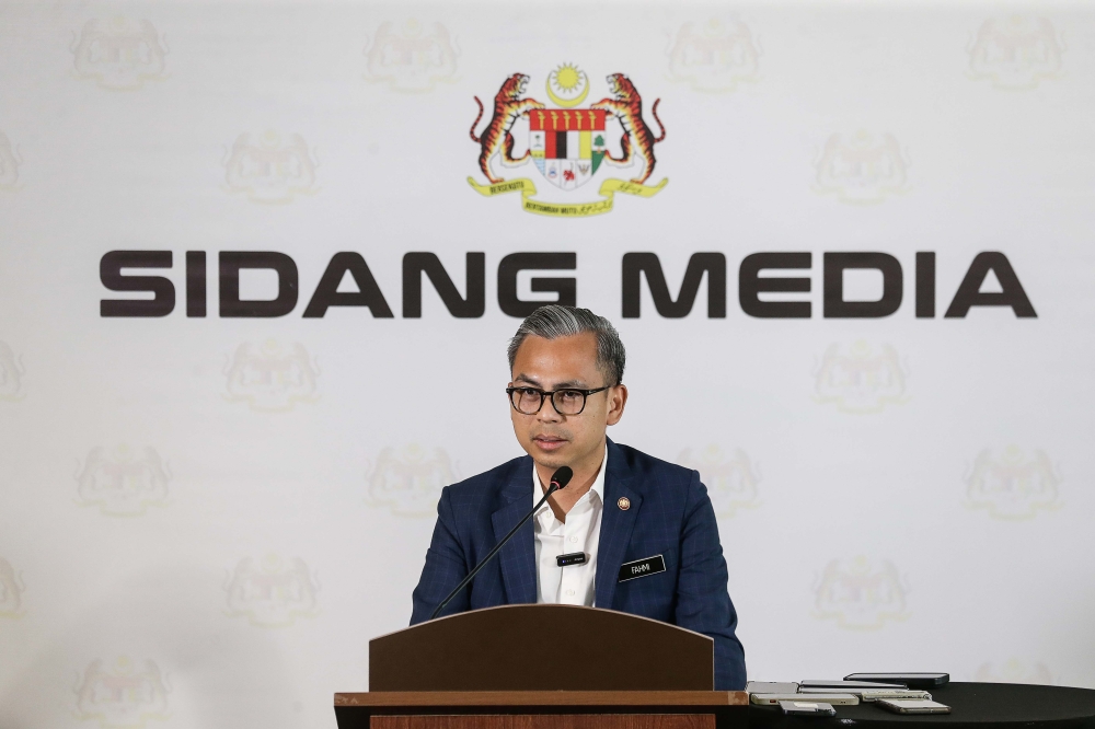 Communications Minister Fahmi Fadzil speaks to the media during a press conference at his ministry in Putrajaya, January 24, 2024. — Picture by Sayuti Zainudin 