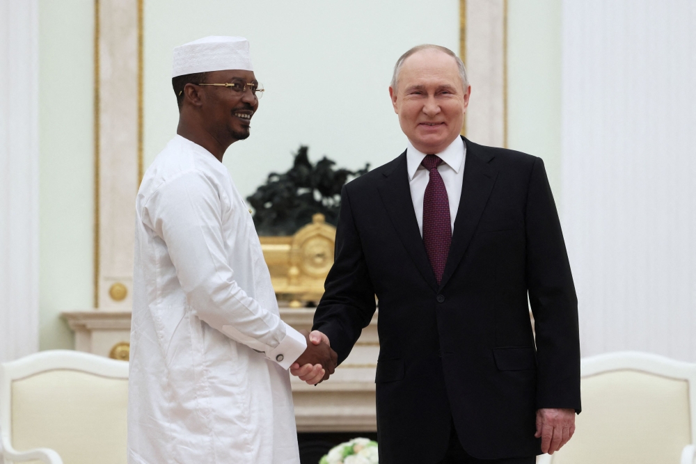 Russia's President Vladimir Putin shakes hands with Chad's interim President Mahamat Idriss Deby during a meeting at the Kremlin in Moscow, Russia January 24, 2024. — Sputnik pool pic