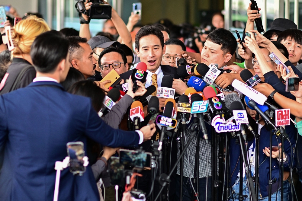 Thailand’s Constitutional Court yesterday cleared thwarted prime ministerial candidate Pita Limjaroenrat of violating election law in a case that could have seen him banned from politics, reinstating him as an MP. — AFP pic