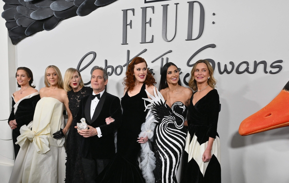 (From left) Diane Lane, Chloe Sevigny, Naomi Watts, Tom Hollander, Molly Ringwald, Demi Moore and Calista Flockhart arrive for FX? ‘Feud: Capote vs. The Swans’ premiere at the Museum of Modern Art in New York. — AFP pic
