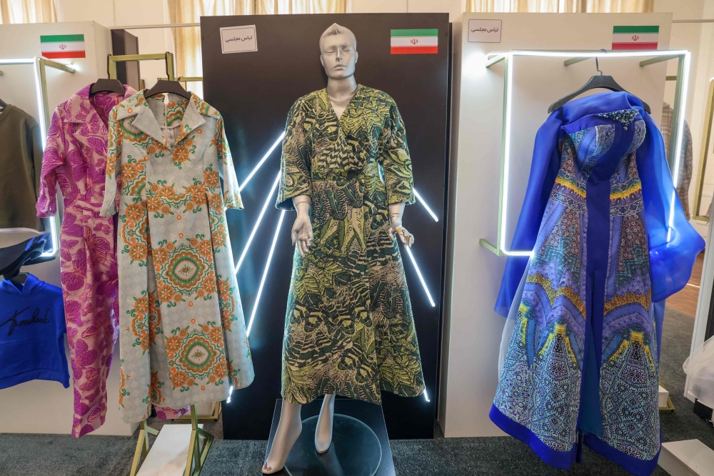 This photograph taken on January 21, 2024 shows creations displayed during the annual exhibition on fashion and clothes designed by young Iranian designers, at the Sadabad Palace Complex, north of the Iranian capital Tehran. — AFP pic