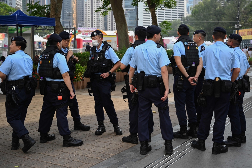 Police patrol at Victoria Park in the Causeway Bay district of Hong Kong on June 2, 2023, the venue where Hong Kong people traditionally gathered annually to mourn the victims of China’s Tiananmen Square crackdown in 1989. — AFP pic