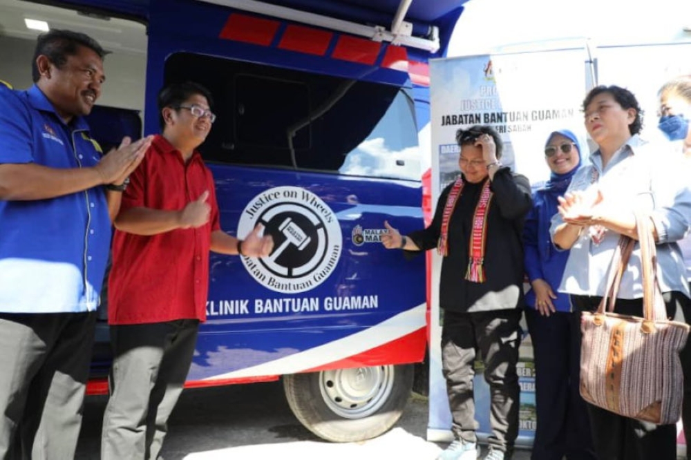 Minister in the Prime Minister’s Department (Law and Institutional Reform) Datuk Seri Azalina Othman  at the launch of the ‘Justice On Wheels’ van, an initiative by the Legal Aid Department, at Dewan Gawir, Kampung Madsiang, Sabah, January 25, 2024. — Picture from X/Bahagian Hal Ehwal Undang-Undang JPM 