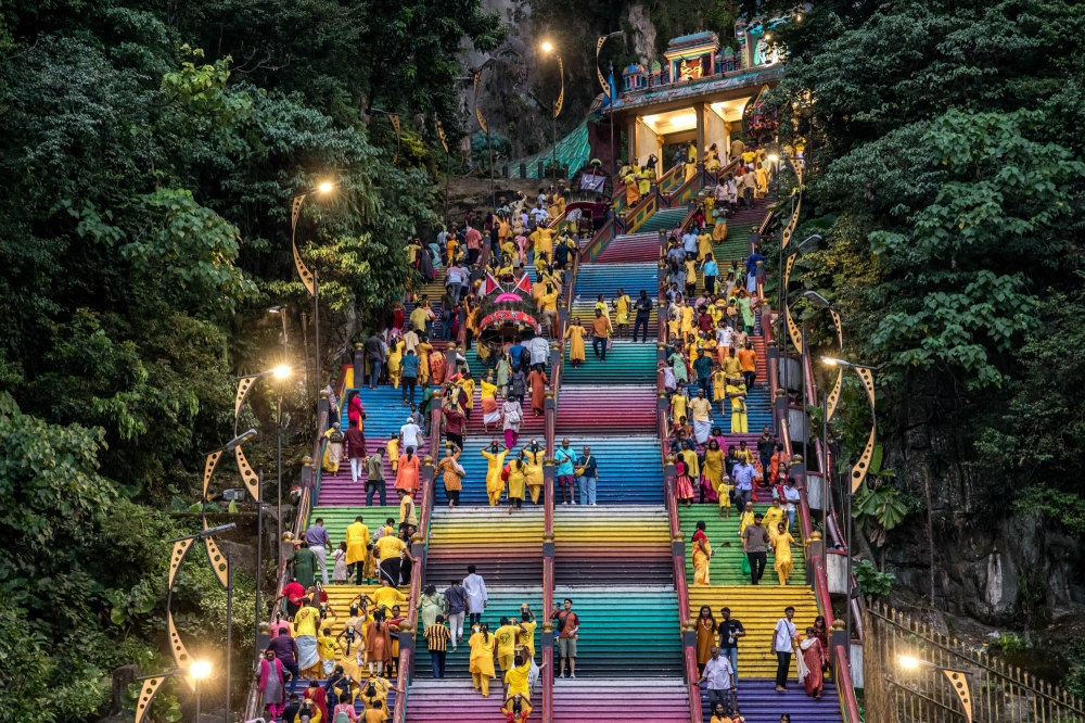 Hindu devotees make their way towards to the Batu Caves temple ahead of the Thaipusam festival in Kuala Lumpur, January 21, 2024. ― Picture by Firdaus Latif