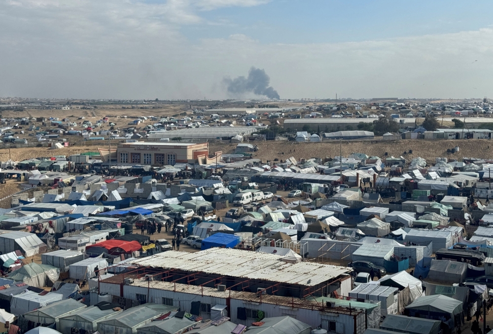 Smoke rises during an Israeli ground operation in Khan Younis, amid the ongoing conflict between Israel and Hamas, as seen from a tent camp sheltering displaced Palestinians in Rafah, in the southern Gaza Strip, January 25, 2024. — Reuters pic