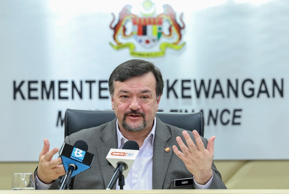 Finance Minister II Datuk Seri Amir Hamzah Azizan speaks at a press conference at the Ministry of Finance, January 26, 2024. — Bernama pic 