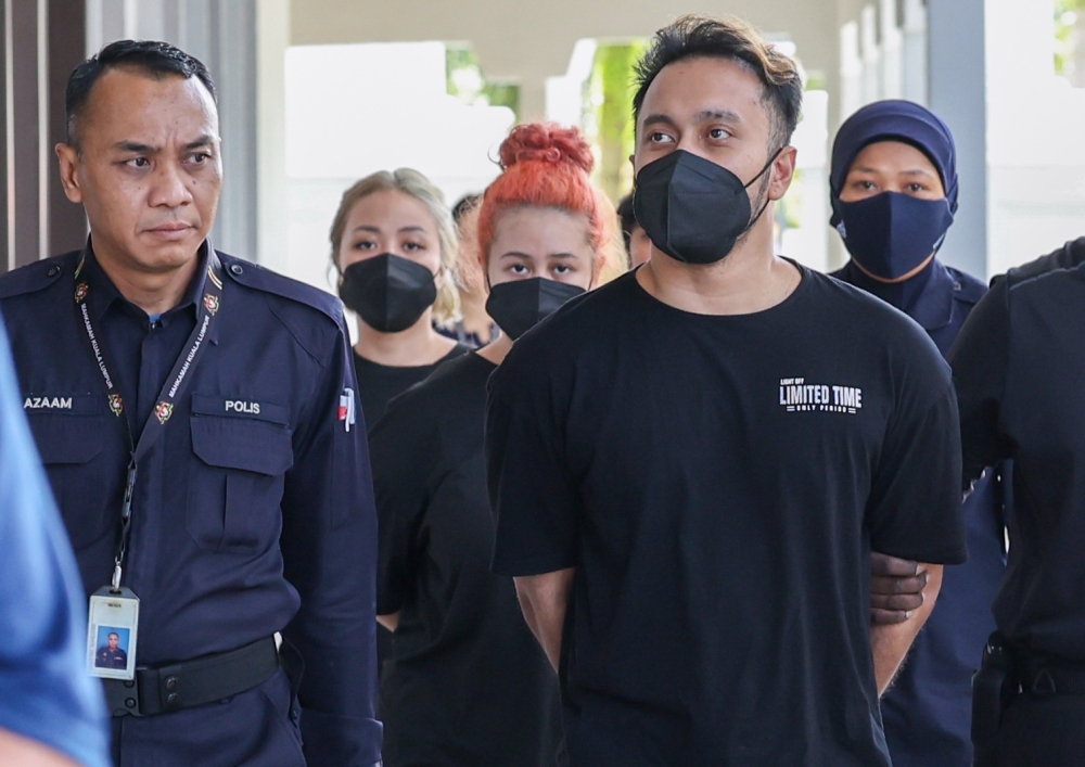 Hasli Ikhwan Arif Zul Hasli, 32, Norshazrina Md Zamri, 27, and Norhidayah Mahadi, 24, were jointly charged with the offence under Section 372(1)(e) of the Penal Code which provides a maximum of 15 years imprisonment with whipping and a fine, if convicted. — Bernama pic 
