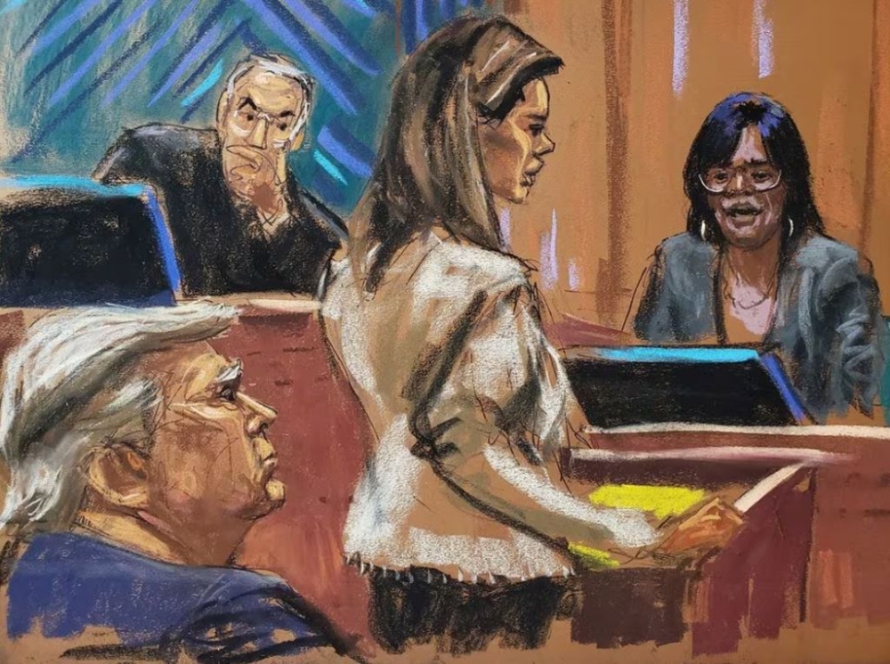 Former US President Donald Trump looks on as his lawyer Alina Habba questions former New York TV news anchor Carol Martin, during the second civil trial where E. Jean Carroll accused former US President Donald Trump of raping her decades ago, at Manhattan Federal Court in New York City, US, January 25, 2024 in this courtroom sketch. — Reuters pic