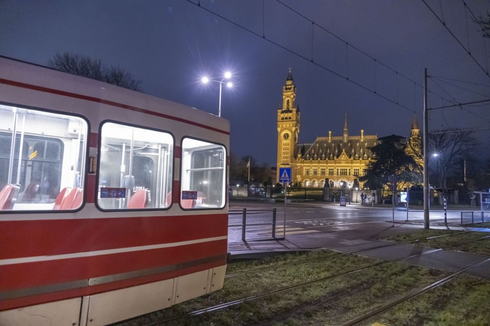 The Peace Palace building of the International Court of Justice a few hours before the ICJ delivers its Order in the case South Africa v Israel, where Israel is accused of commiting Genocide in the Gaza Strip and the Palestinian People. Night view of the illuminated building of the Peace Palace, it houses the International Court of Justice, which is the principal judicial body of the United Nations, the Permanent Court of Arbitration PCA, The Hague Academy of International Law and the Peace Palace Library. — Reuters pic