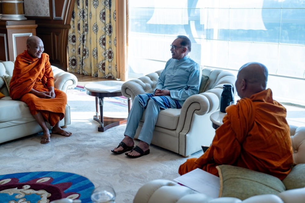 Prime Minister Datuk Seri Anwar Ibrahim meets with the Malaysian Siamese Buddhist Monk Association during a courtesy call in Putrajaya, January 26, 2024. — Picture from X/Anwar Ibrahim 