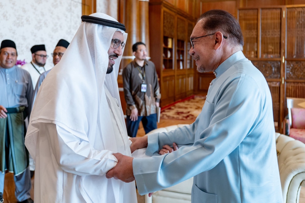 Prime Minister Datuk Seri Anwar Ibrahim greets Muslim thinker Sheikh Tareq Al-Suwaidan when he called on the prime minister in Putrajaya, January 26, 2024. — Picture from X/Anwar Ibrahim 