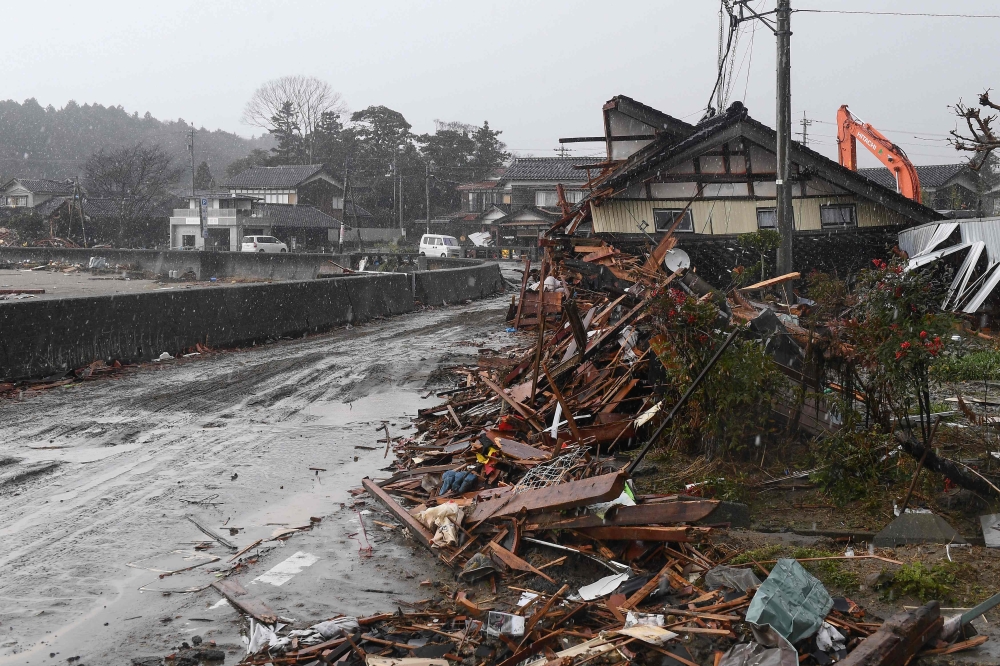 The magnitude-7.5 earthquake and its aftershocks devastated parts of Ishikawa prefecture on the Sea of Japan coast, toppling buildings, ripping up roads and sparking a major fire. — AFP pic