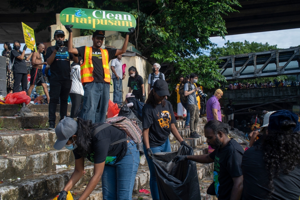 Volunteers from Clean Thaipusam raising awareness on a clean Thaipusam celebration. — Picture by Shafwan Zaidon