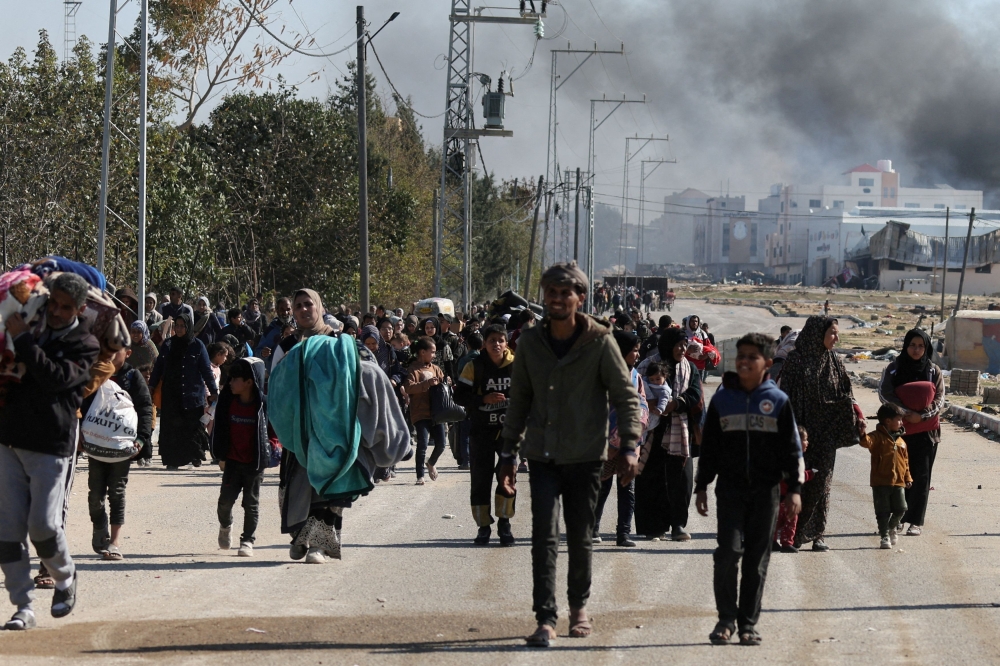 Palestinians fleeing Khan Younis, due to the Israeli ground operation, amid the ongoing conflict between Israel and the Palestinian Islamist group Hamas, move towards Rafah, in the southern Gaza Strip, January 25, 2024. — Reuters pic