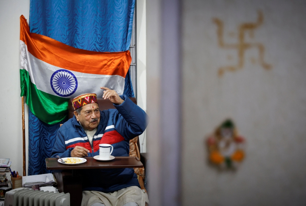 Indresh Kumar, a senior leader of the Hindu nationalist organisation Rashtriya Swayamsevak Sangh (RSS) gestures as he talks to people inside his office in New Delhi, India, January 26, 2024. — Reuters pic