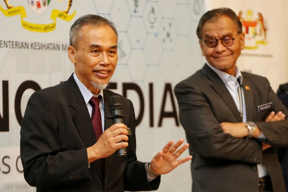 Dr Muhammad Radzi (left) said the ministry of health is committed to providing continuous care for rare disease patients through comprehensive service management and treatment. ― File picture by Choo Choy May