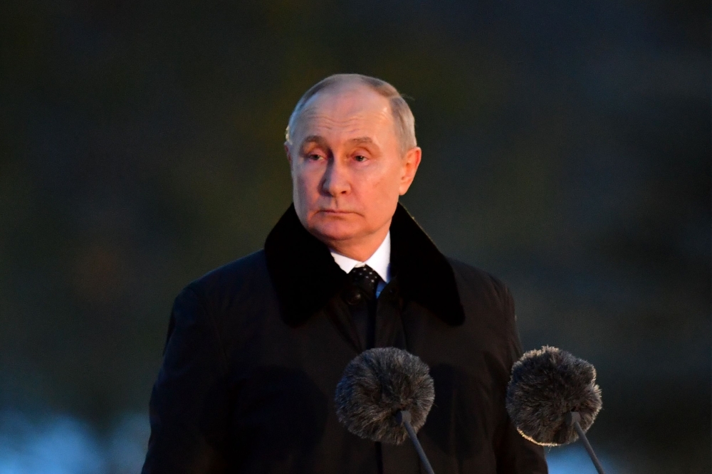 Russia’s President Vladimir Putin delivers a speech during the opening ceremony of a monument to civilians killed during World War Two, near the village of Zaitsevo, Leningrad region, on January 27, 2024, as part of events marking the 80th anniversary of the liberation of Leningrad from Nazi blockade during WWII. — AFP pic