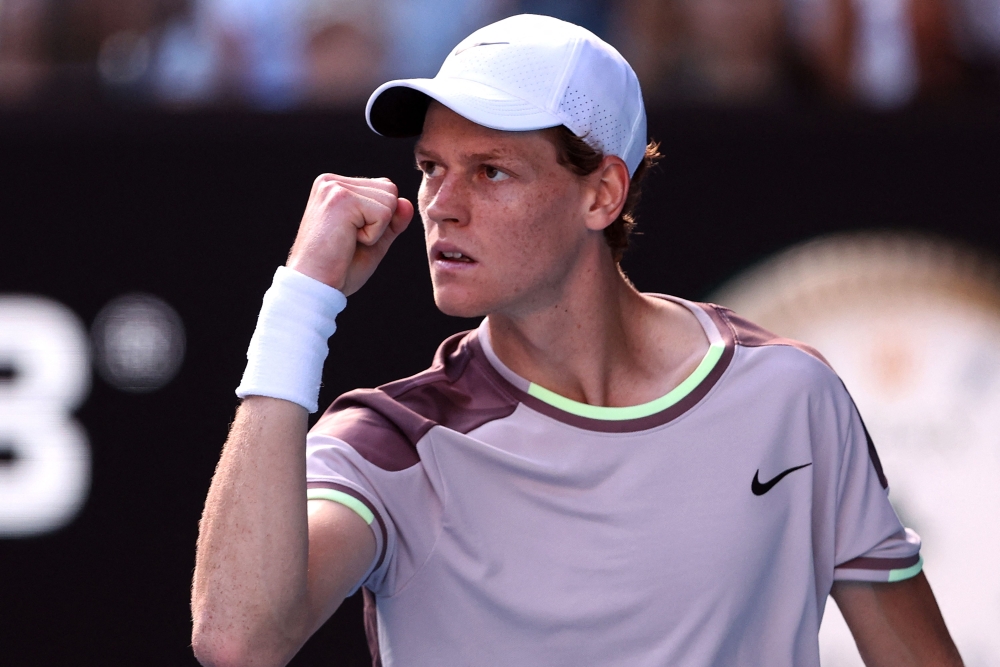 Italy's Jannik Sinner reacts on a point against Serbia's Novak Djokovic during their men's singles semi-final match on day 13 of the Australian Open tennis tournament in Melbourne on January 26, 2024. — AFP pic