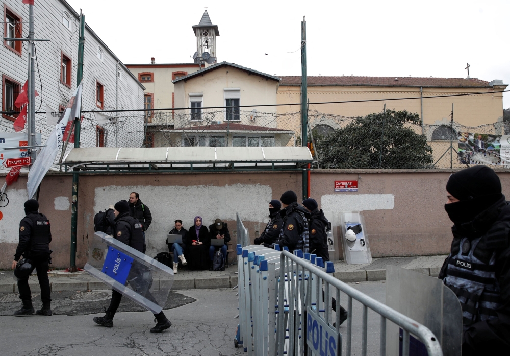 Turkish police stand guard outside the Italian Santa Maria Catholic Church after two masked gunmen were shooting during Sunday service, in Istanbul, Turkey January 28, 2024. — Reuters pic