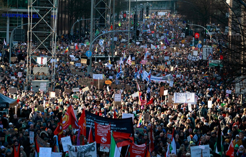 Protesters take part in a demonstration against racism and far-right politics on January 28, 2024 in Hamburg, northern Germany. — AFP pic