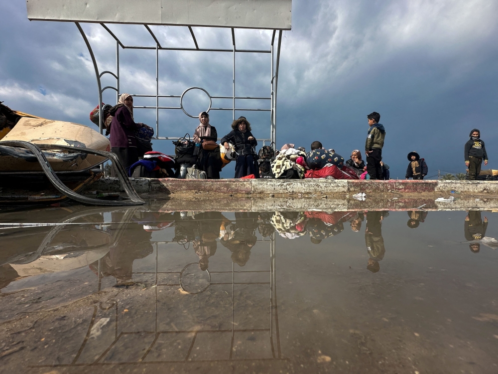 Palestinians fleeing Khan Younis, due to the Israeli ground operation, move towards Rafah, amid the ongoing conflict between Israel and the Palestinian Islamist group Hamas, in the southern Gaza Strip, January 29, 2024. — Reuters pic