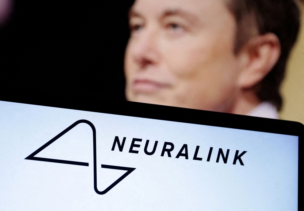 Elon Musk says the first human patient who received an implant from Neuralink on Sunday is recovering well. ― Reuters pic