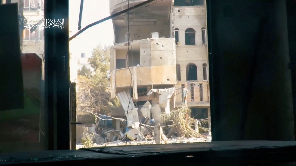 A view shows a damaged building, amid the ongoing conflict between Israel and the Palestinian group Hamas, in a location given as Khan Younis, Gaza Strip, in this still image obtained from a video released January 29, 2024. ― Hamas Military Wing/Handout via Reuters