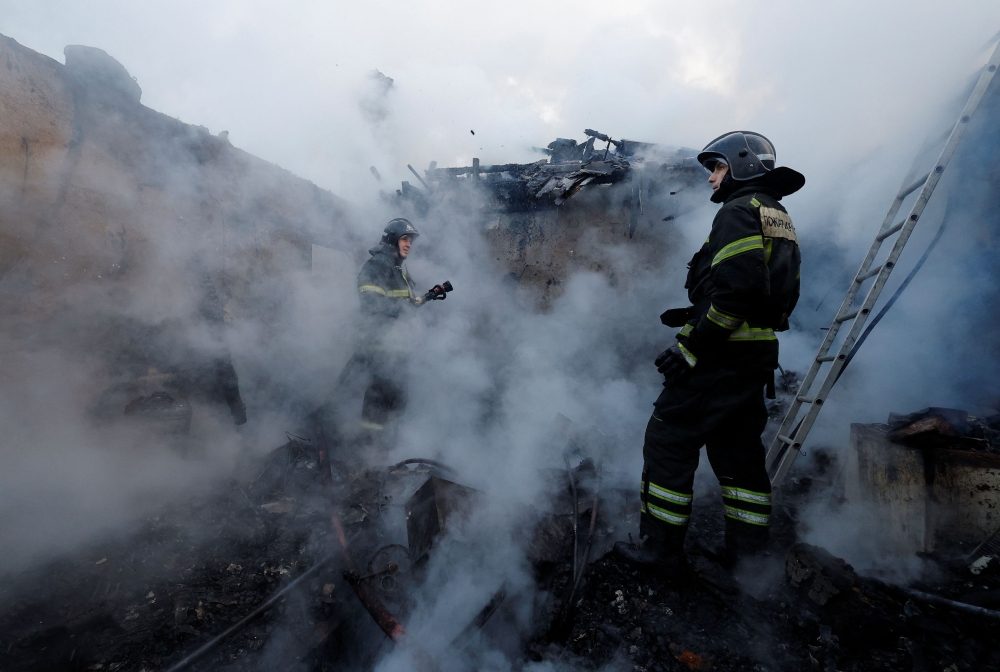 Firefighters work amid debris of a destroyed building in a residential area hit by recent shelling in the course of Russia-Ukraine conflict in Donetsk, Russian-controlled Ukraine, January 29, 2024. ― Reuters pic