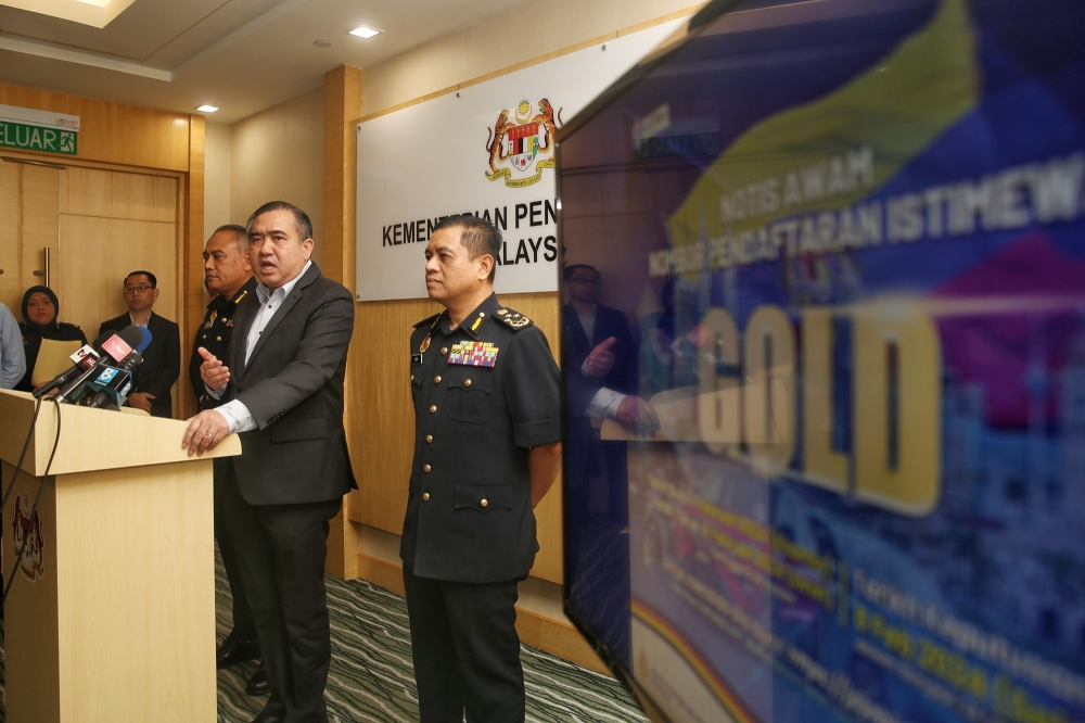 Transport Minister Anthony Loke speaks during a press conference to announce the special 'GOLD' series vehicle number plates, in Putrajaya January 30, 2024. — Picture by Choo Choy May