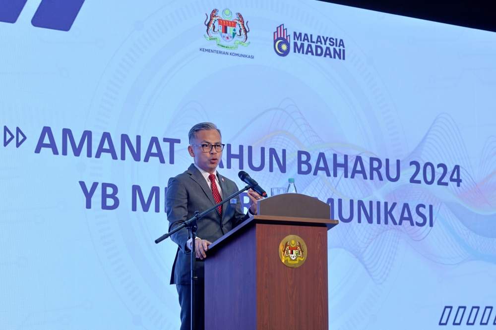 Communications Minister Fahmi Fadzil said it is very important for media practitioners to verify the authenticity of the information received before publishing it. — Bernama pic 