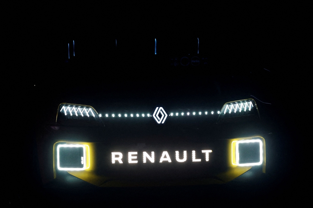 A Renault 5 E-TECH Electric Prototype car is displayed during Renault Group capital market day for its new electric vehicle unit Ampere, in Paris November 15, 2023.  Renault today called off the IPO of its electric car and software subsidiary Ampere, saying the market conditions were no longer favourable. — Reuters pic  