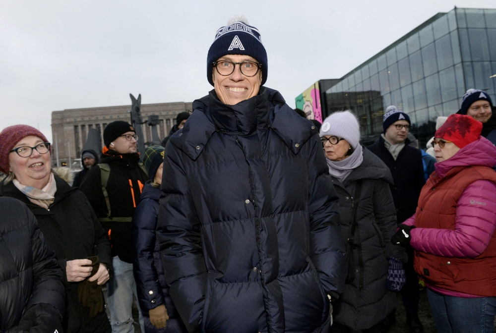 National Coalition Party (NCP) presidential candidate Alexander Stubb continues campaigning as people join him for a walk in Helsinki, Finland, on January 29, 2024.  — Lehtikuva pic via Reuters