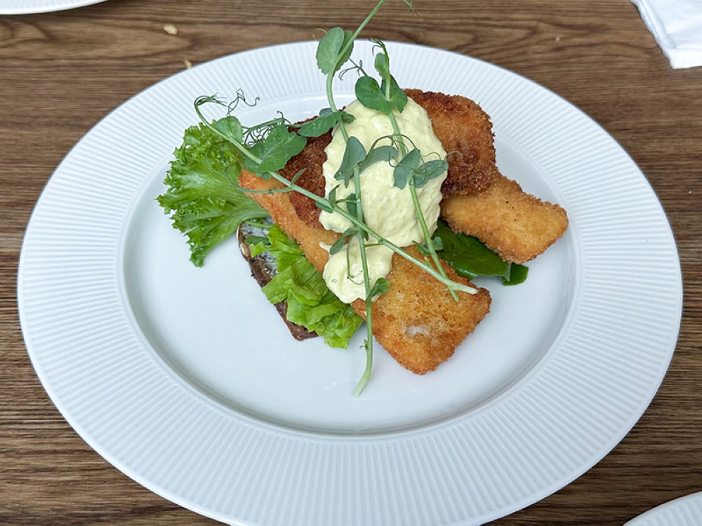 Crispy Fried Pollock fillet smørrebrød will be ideal for those who prefer seafood as the fish is topped with remoulade and lemon