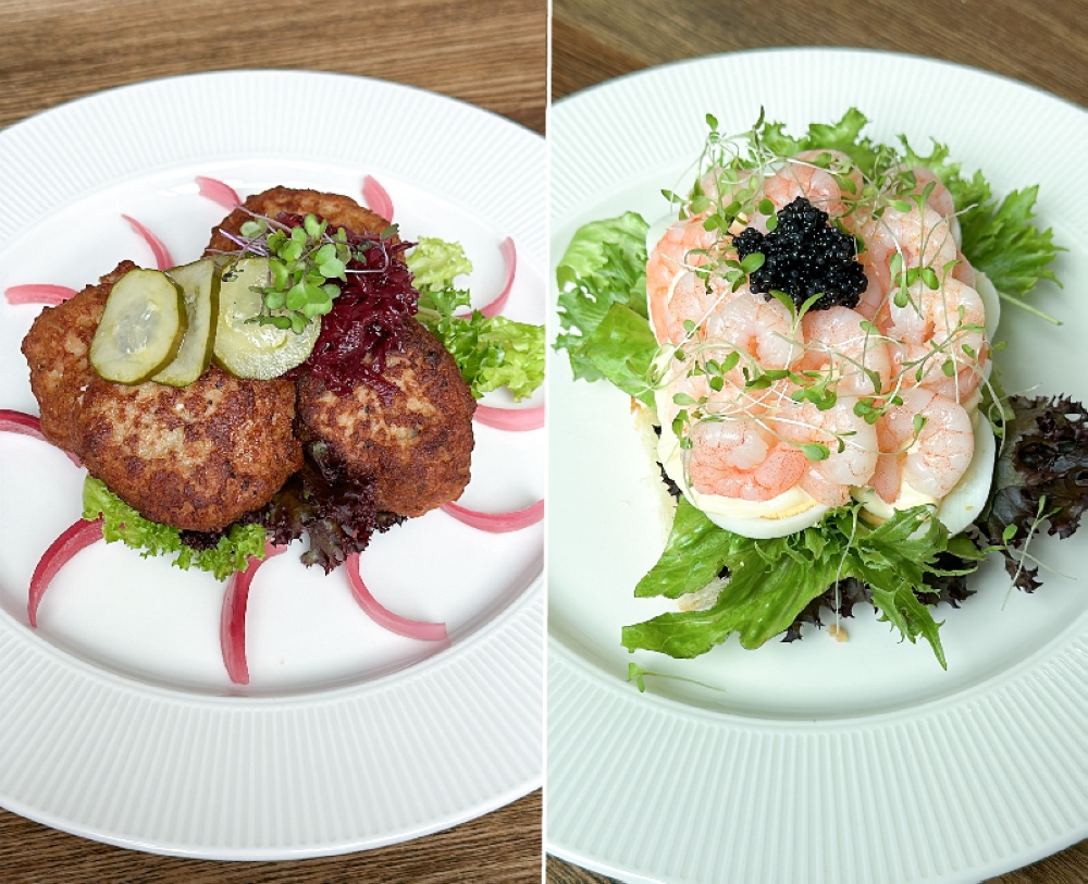 Juicy Fried Pork Meatballs smørrebrød is paired with marinated red cabbage and pickled onions (left). Egg and Shrimps smørrebrød is the only item in the menu that uses toasted white bread since the shrimps have a delicate flavour (right)