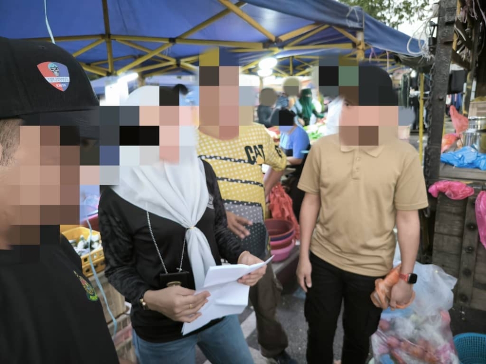The joint operation also targeted foreign beggars who claim that donations are for the funding for a religious school that is non-existent, January 31, 2024. ― Picture courtesy of the Johor Immigration Department