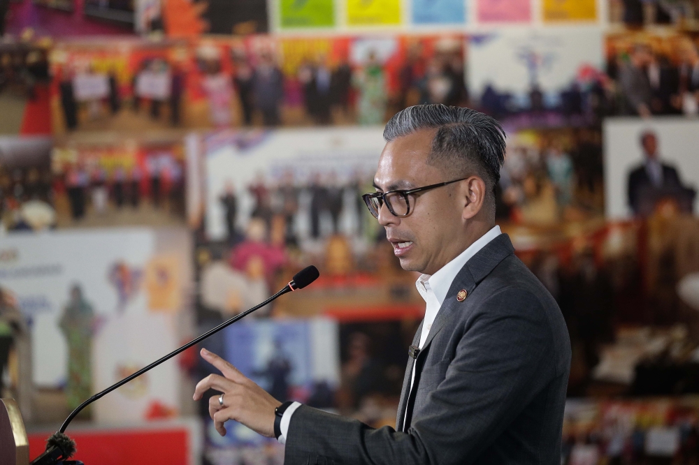 Communications Minister Fahmi Fadzil speaks to the press during a press conference at the Communication Ministry in Putrajaya January 31, 2024. — Picture by Sayuti Zainudin 